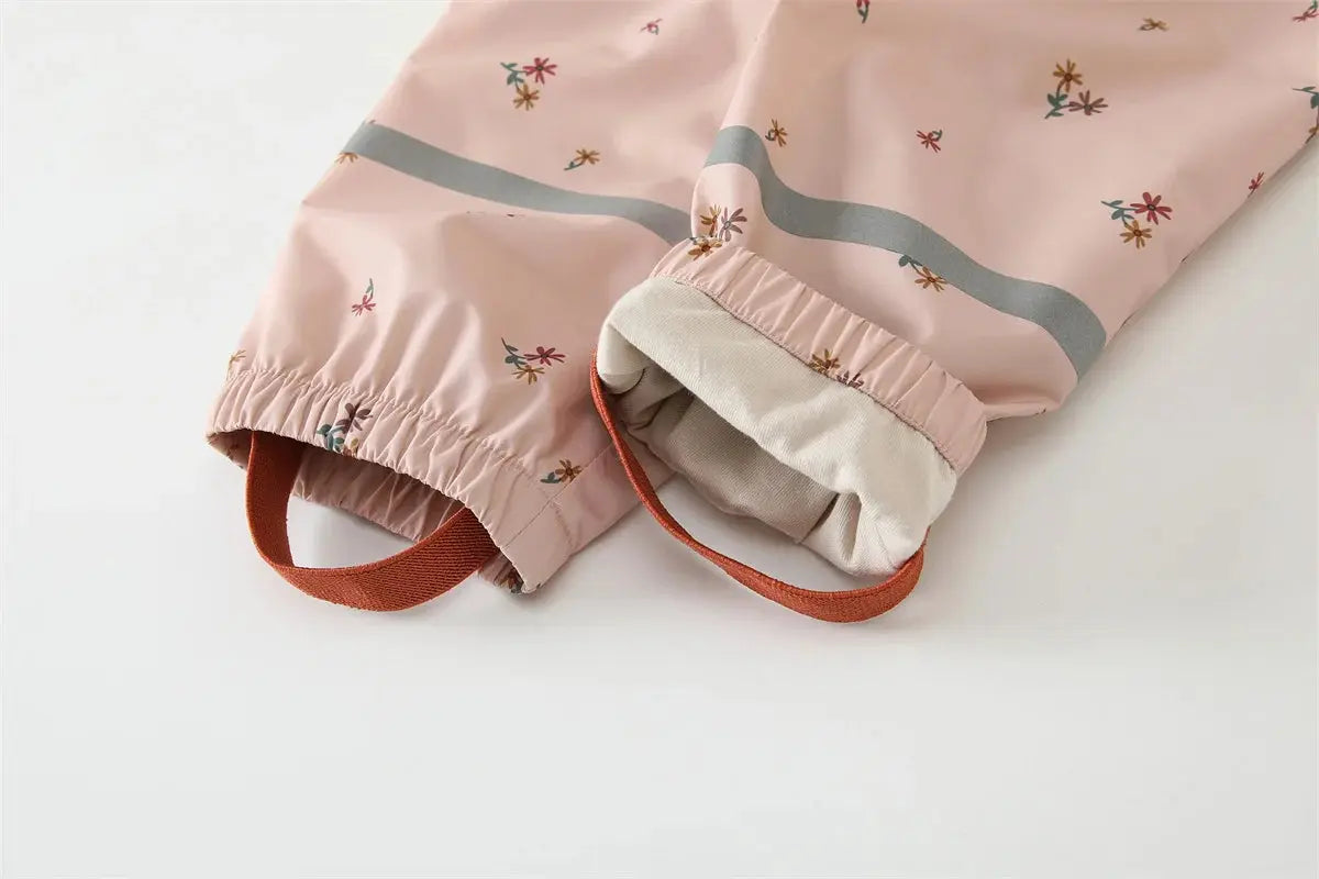 Elastic ankle with foot strap and reflective band on HONEYKING bib rain pants