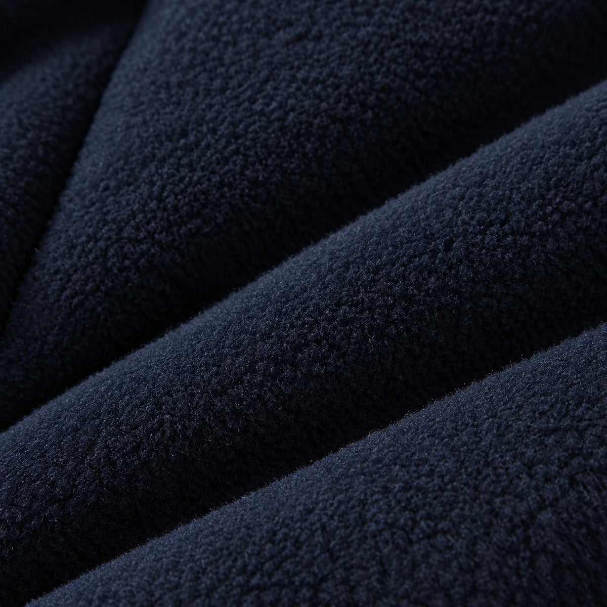 Soft navy fleece lining inside HONEYKING kids’ one-piece snowsuit