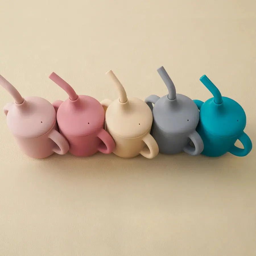 SipEase silicone sippy cups with straw in several colors side by side