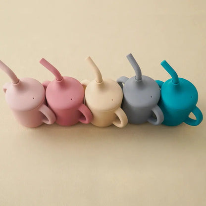 SipEase silicone sippy cups with straw in several colors side by side